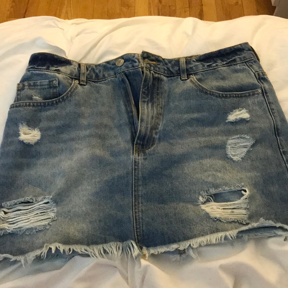Ripped denim mini skirt
